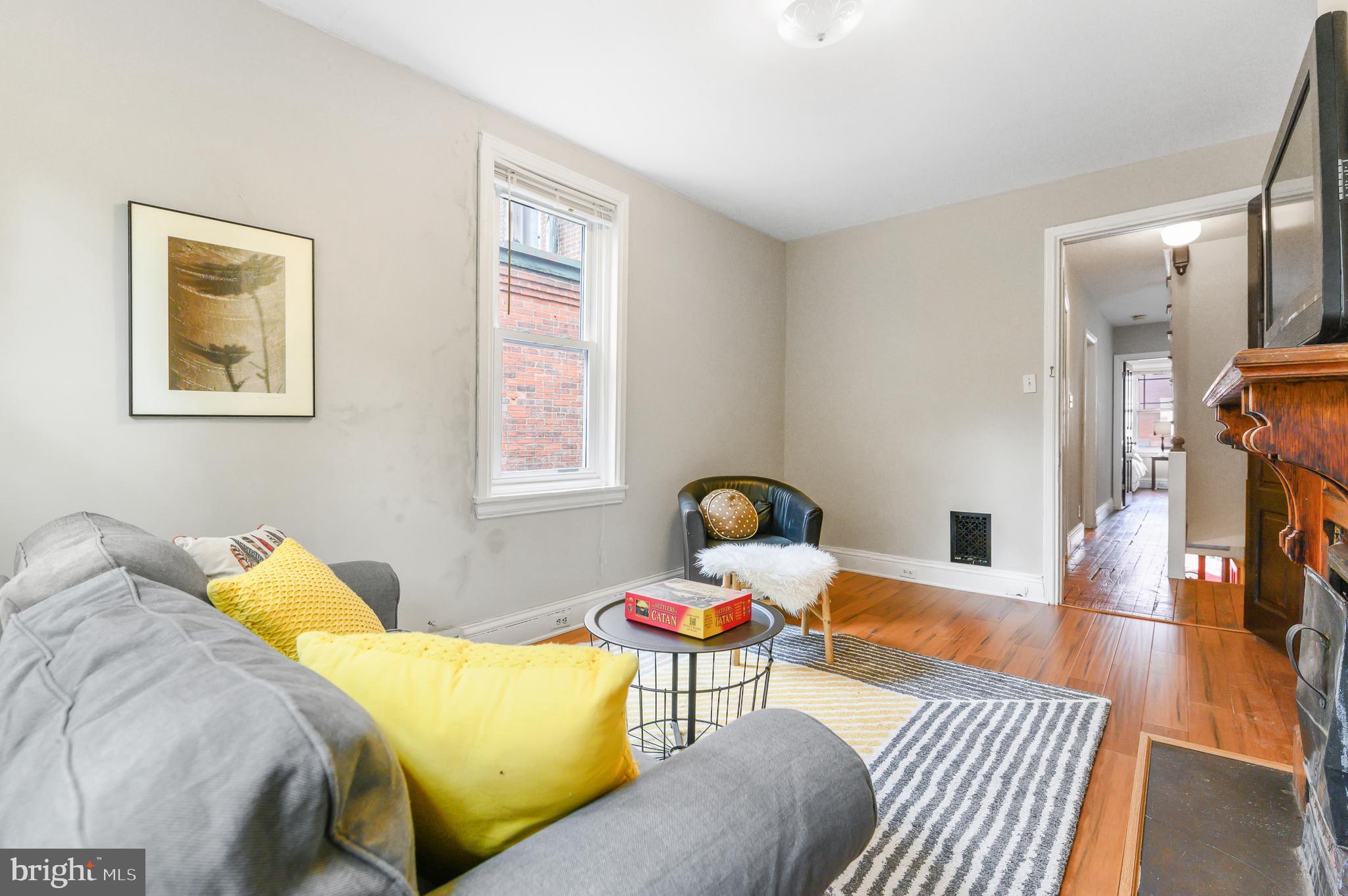 4248 Regent Square Philadelphia, PA 19104 - Photo 20 of 32 a bedroom with a bed and wooden floor