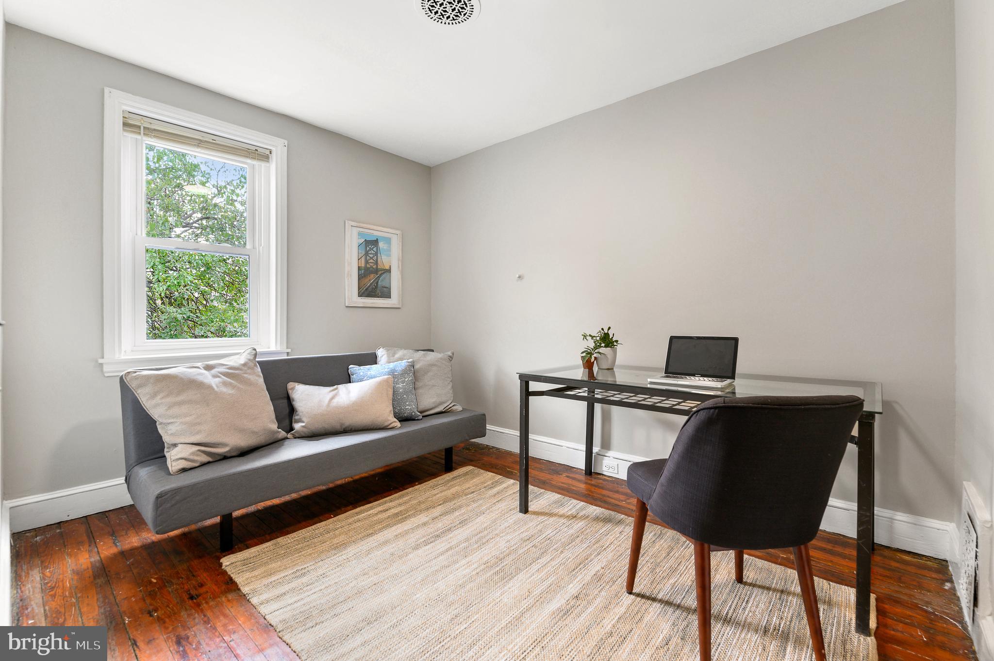 4248 Regent Square Philadelphia, PA 19104 - Photo 26 of 32 a living room with furniture and a window