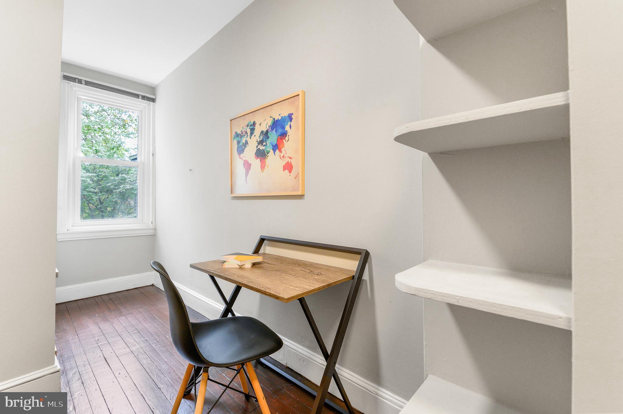 4248 Regent Square Philadelphia, PA 19104 - Photo 27 of 32 a view of a workspace with furniture and wooden floor