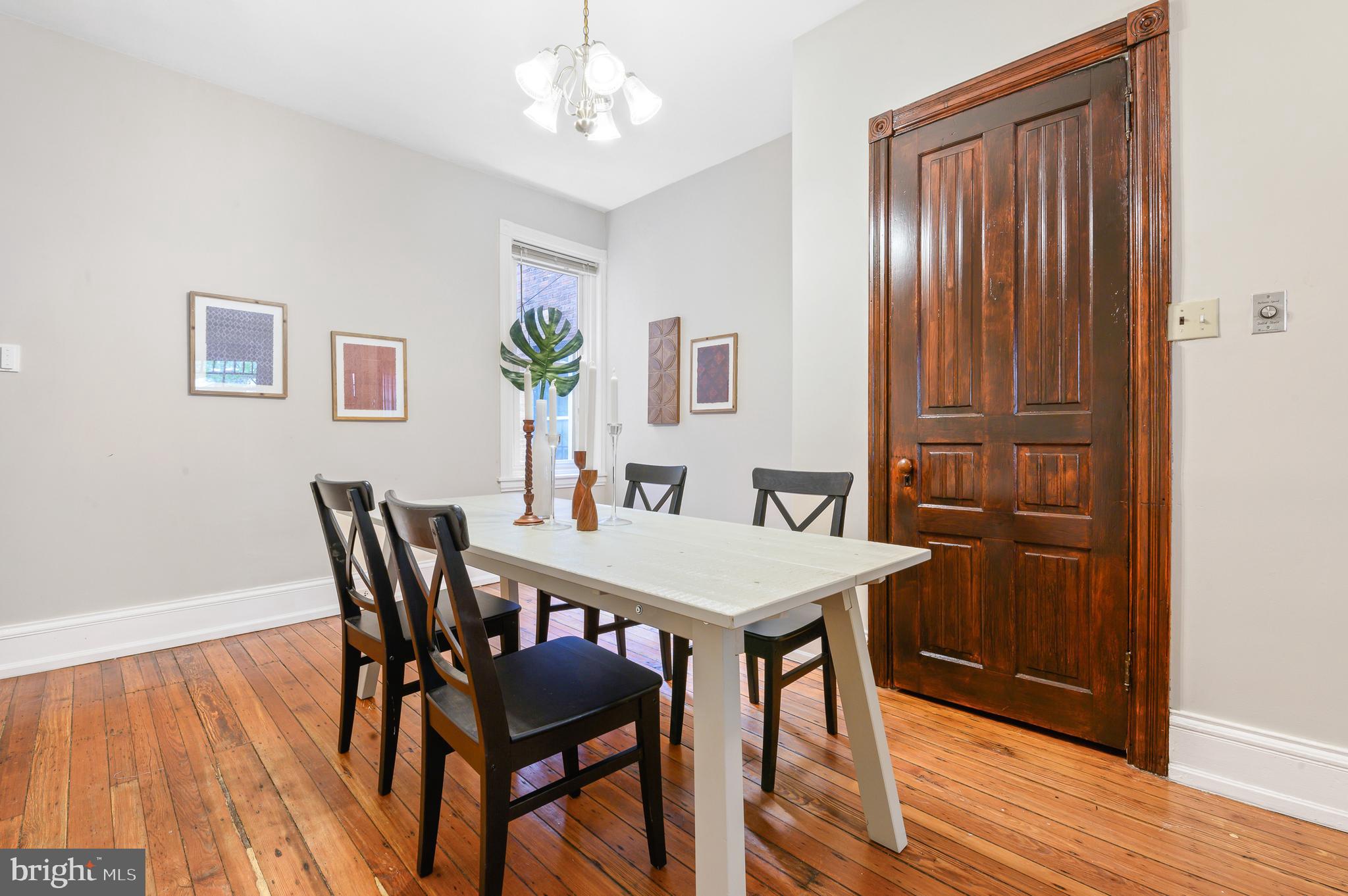 4248 Regent Square Philadelphia, PA 19104 - Photo 6 of 32 a view of a dining room with furniture and wooden floor