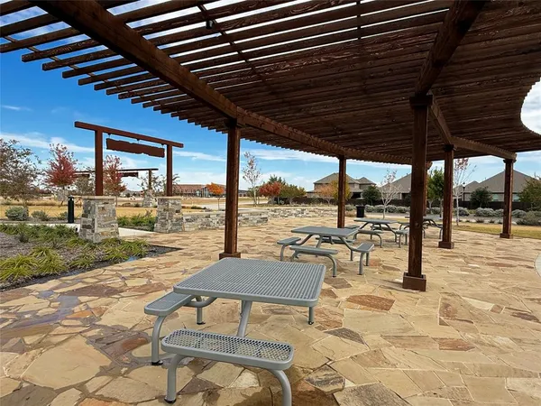 a outdoor space with lots of tables and chairs