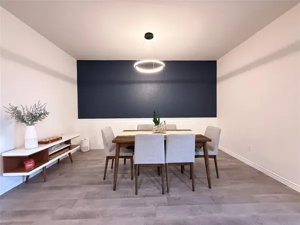 a view of a dining room with furniture