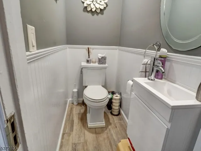 a bathroom with a toilet and a sink