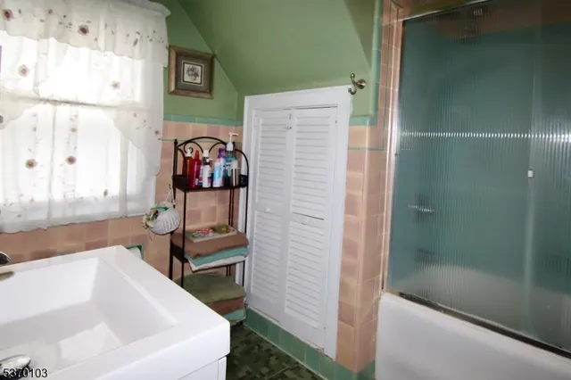 a bathroom with a sink and a bathtub