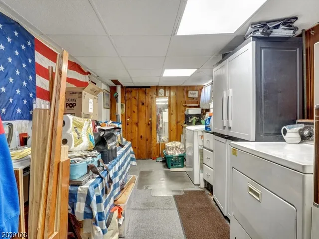 a swimming pool with an outdoor space and seating area