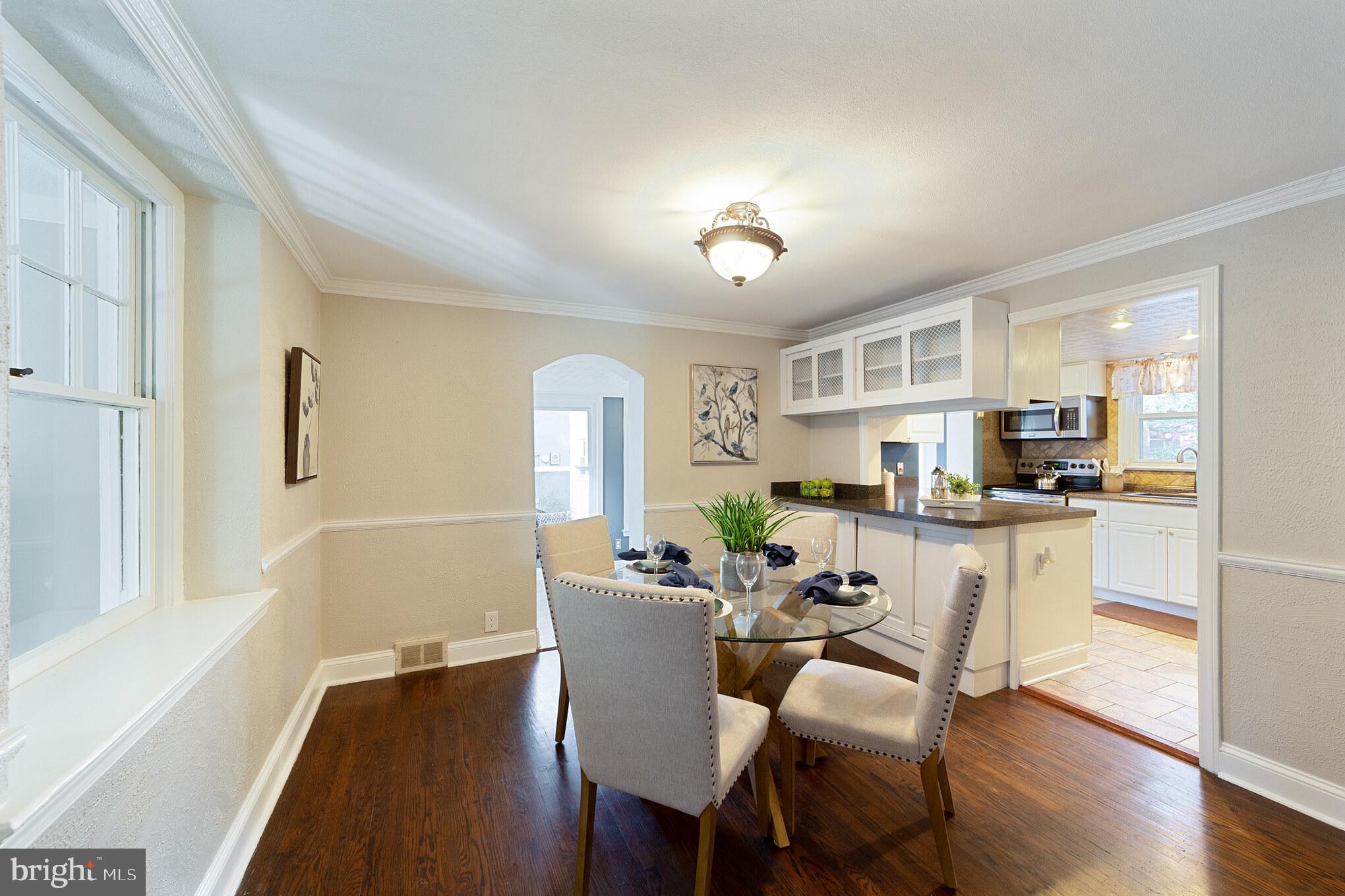 1217 Providence Road Springfield, PA 19064 - Photo 12 of 41 a view of a dining room with furniture and wooden floor