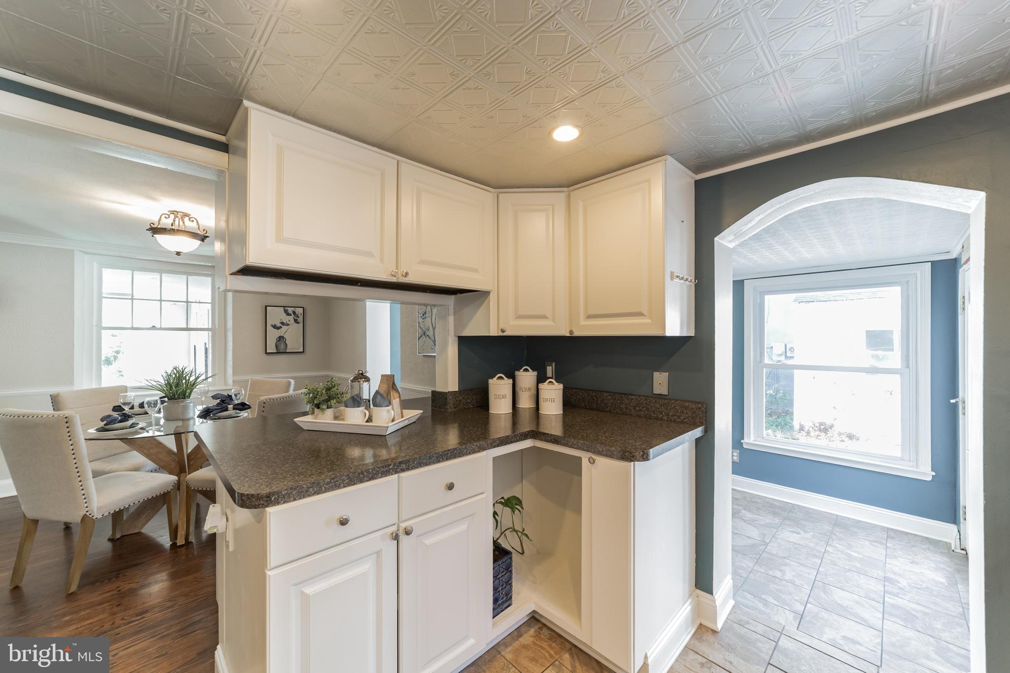 1217 Providence Road Springfield, PA 19064 - Photo 17 of 41 a kitchen with a sink cabinets and window