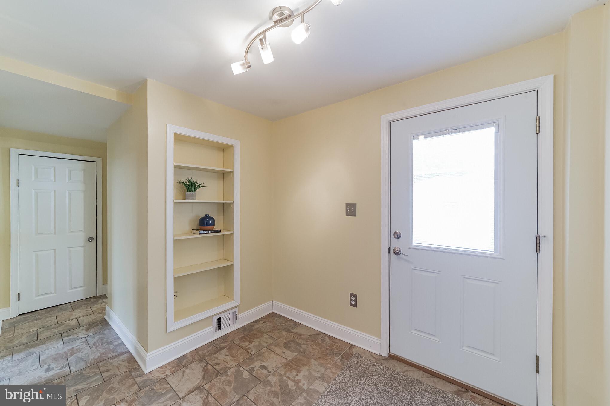 1217 Providence Road Springfield, PA 19064 - Photo 21 of 41 a view of an empty room with a window