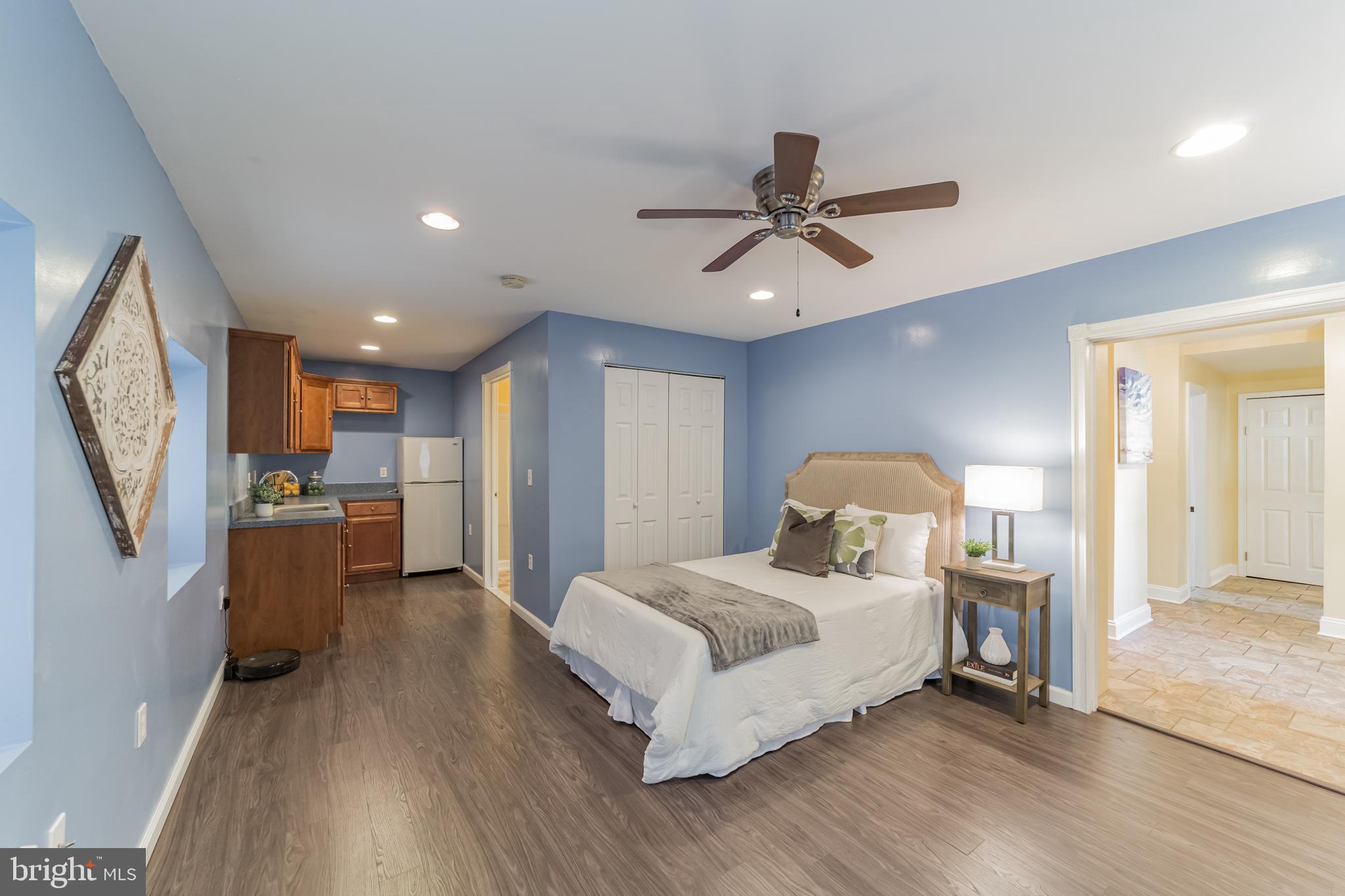 1217 Providence Road Springfield, PA 19064 - Photo 24 of 41 a spacious bedroom with a bed and a flat screen tv