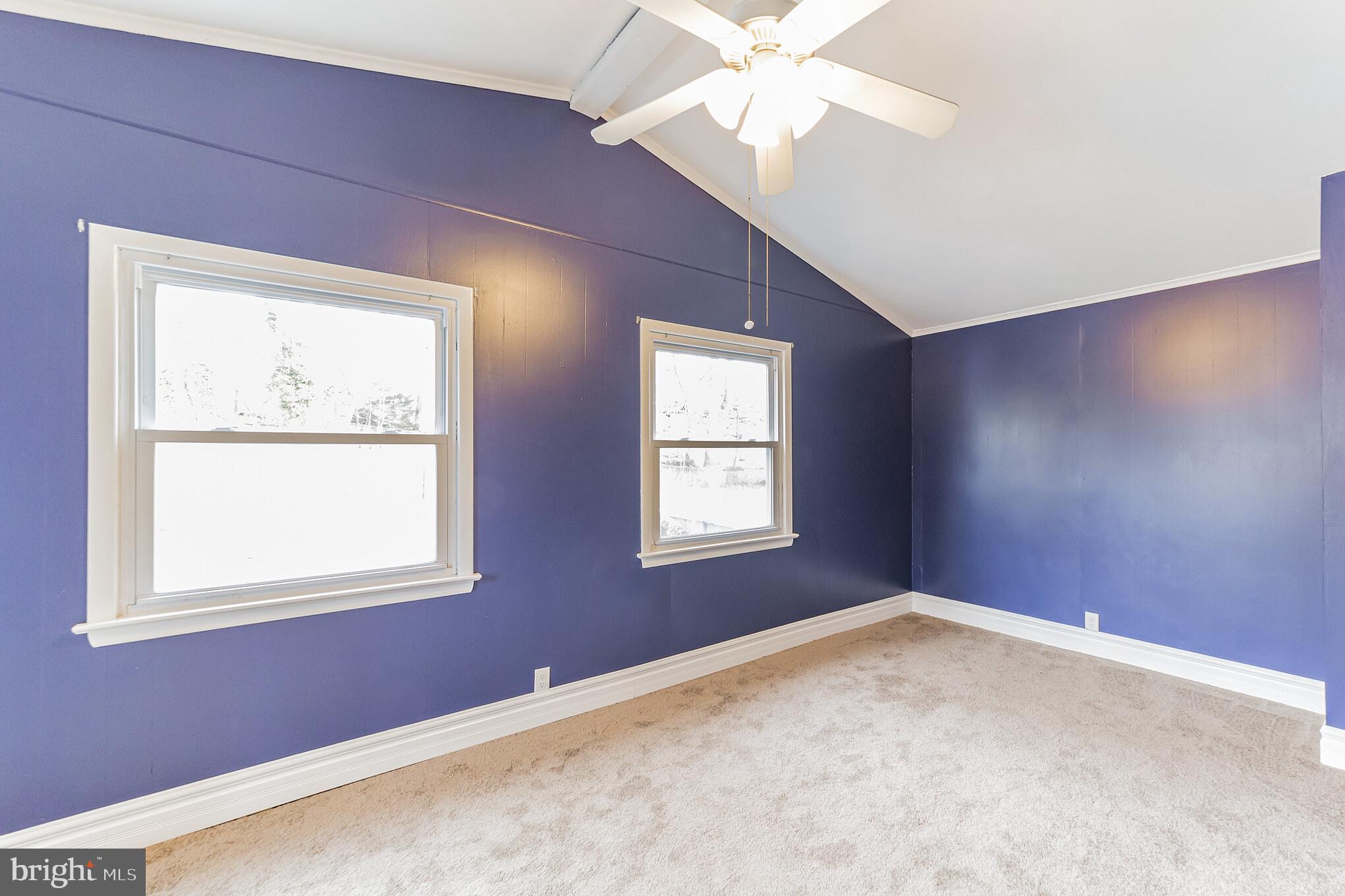 1217 Providence Road Springfield, PA 19064 - Photo 33 of 41 an empty room with a window and ceiling fan