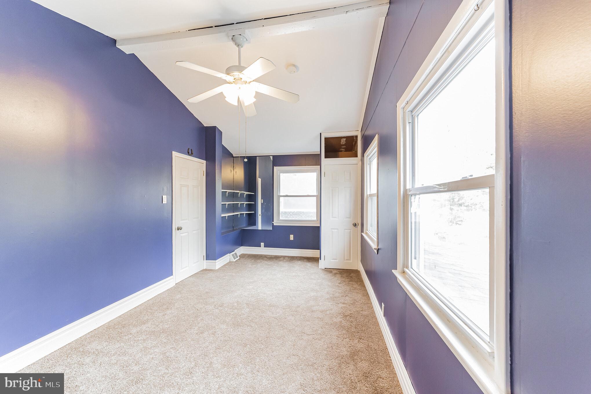 1217 Providence Road Springfield, PA 19064 - Photo 34 of 41 a view of a big room with wooden floor and windows