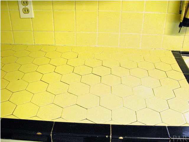 103 Brandywine Road Pensacola, FL 32507 - Photo 8 of 17 CLOSE UP VIEW OF TILE COUNTER TOP IN KITCHEN