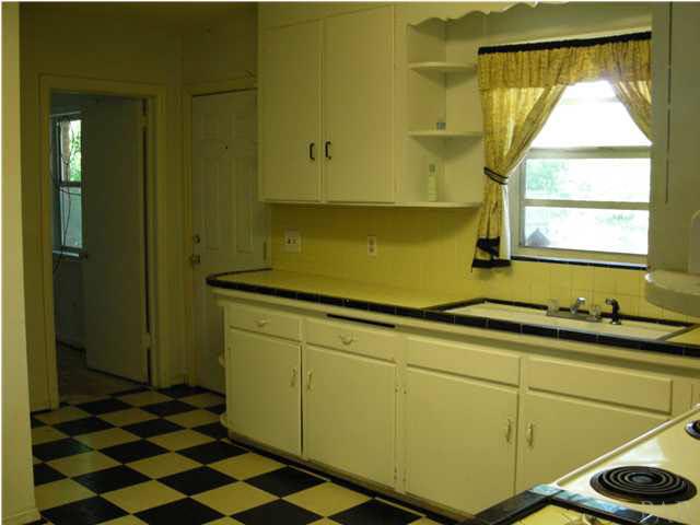 103 Brandywine Road Pensacola, FL 32507 - Photo 9 of 17 ANOTHER VIEW OF KITCHEN SHOWING REAR EXIT DOOR