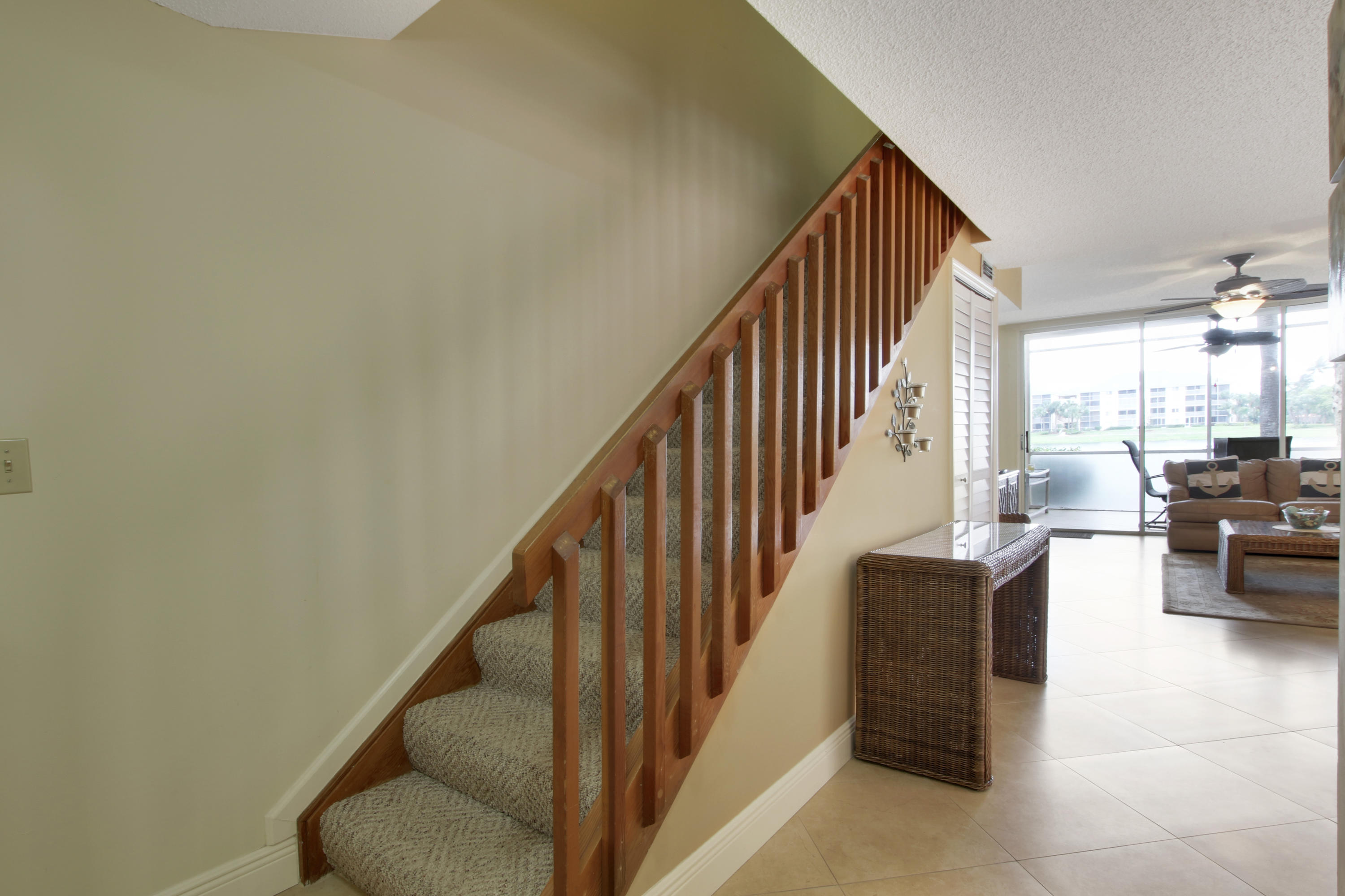 353 Highway 1, Unit C105 Jupiter, FL 33477 - Photo 17 of 33 a view of livingroom with furniture and stairs