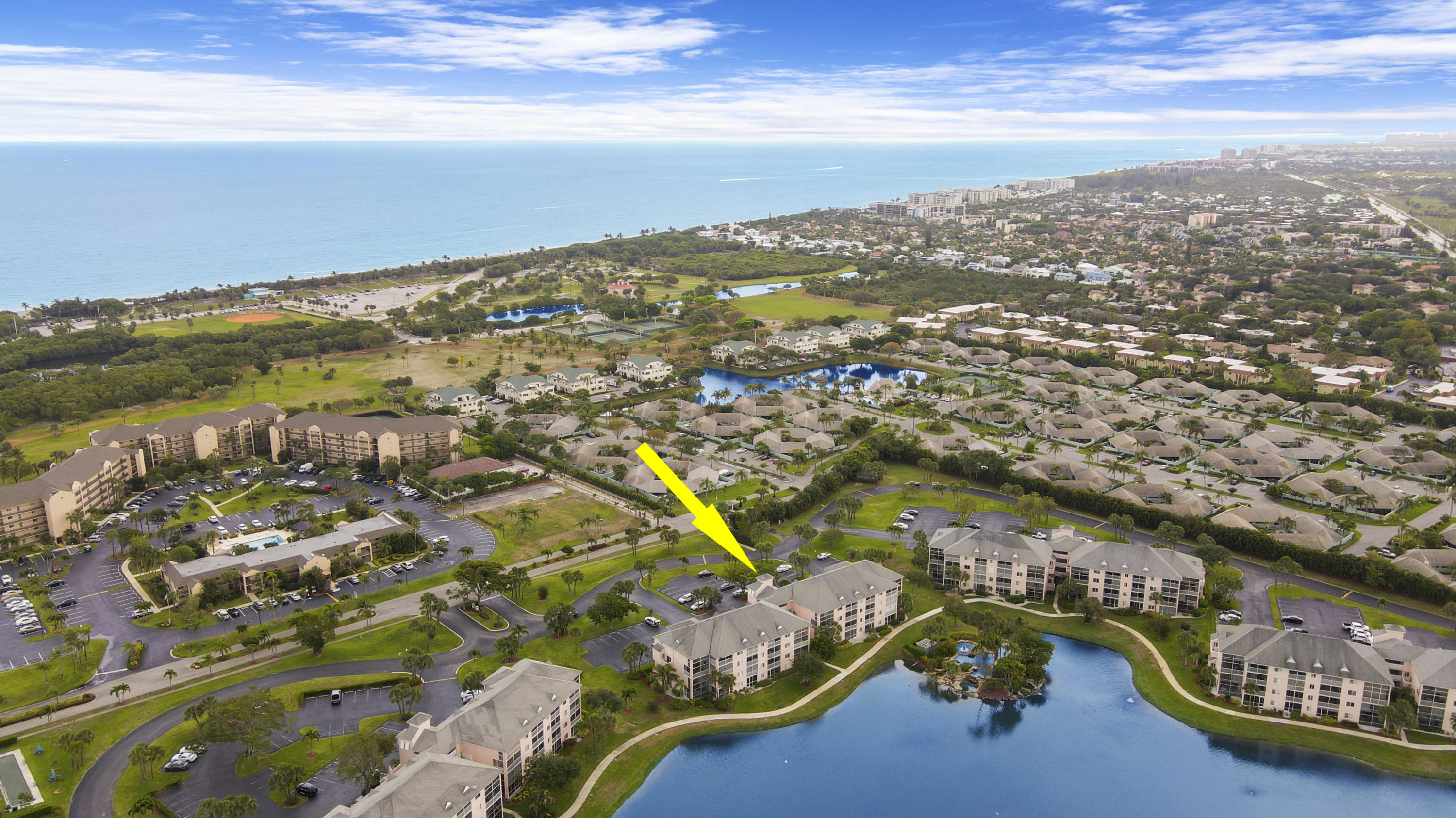 353 Highway 1, Unit C105 Jupiter, FL 33477 - Photo 27 of 33 an aerial view of residential houses with outdoor space