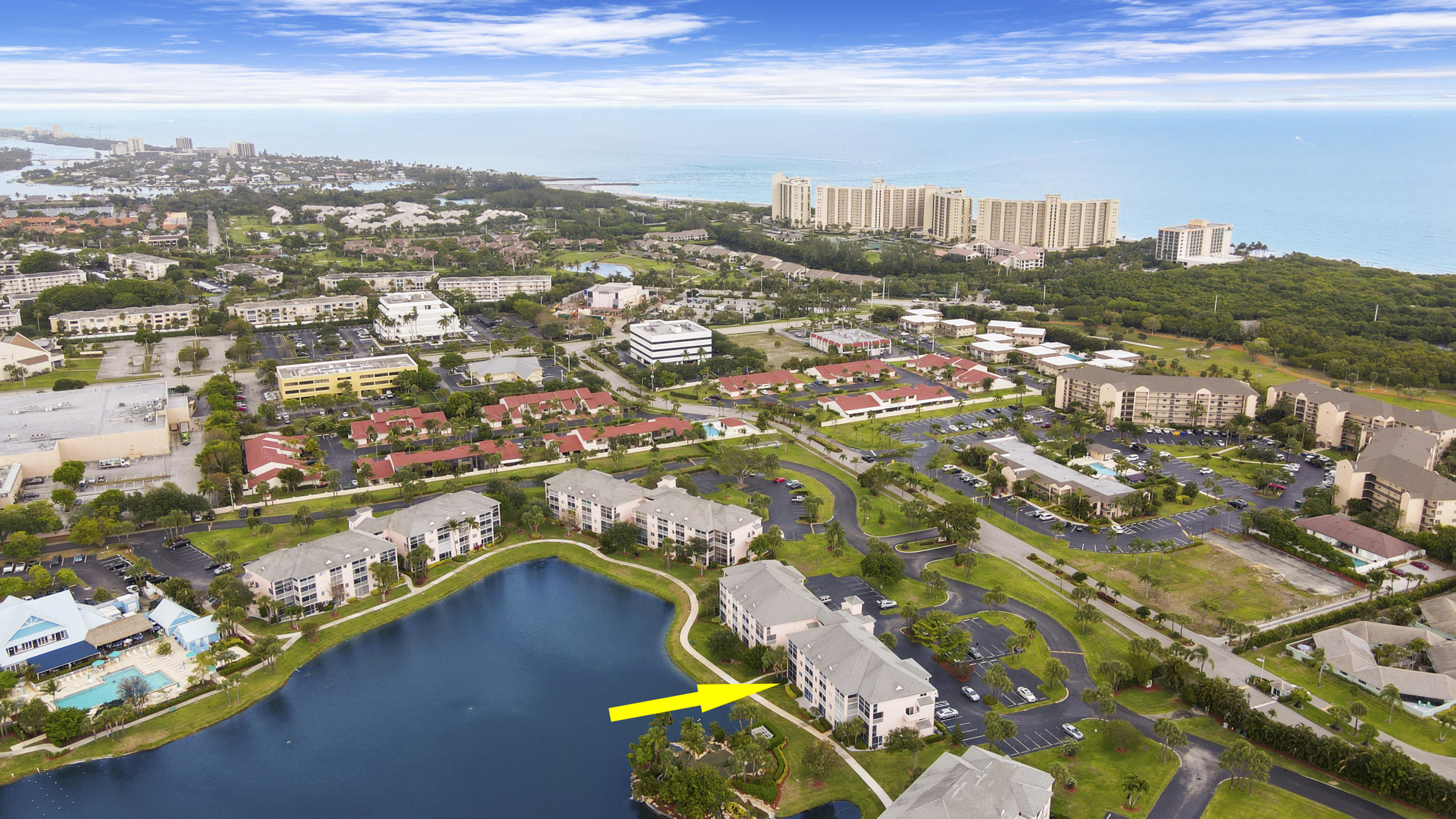 353 Highway 1, Unit C105 Jupiter, FL 33477 - Photo 29 of 33 an aerial view of residential houses with outdoor space and ocean view