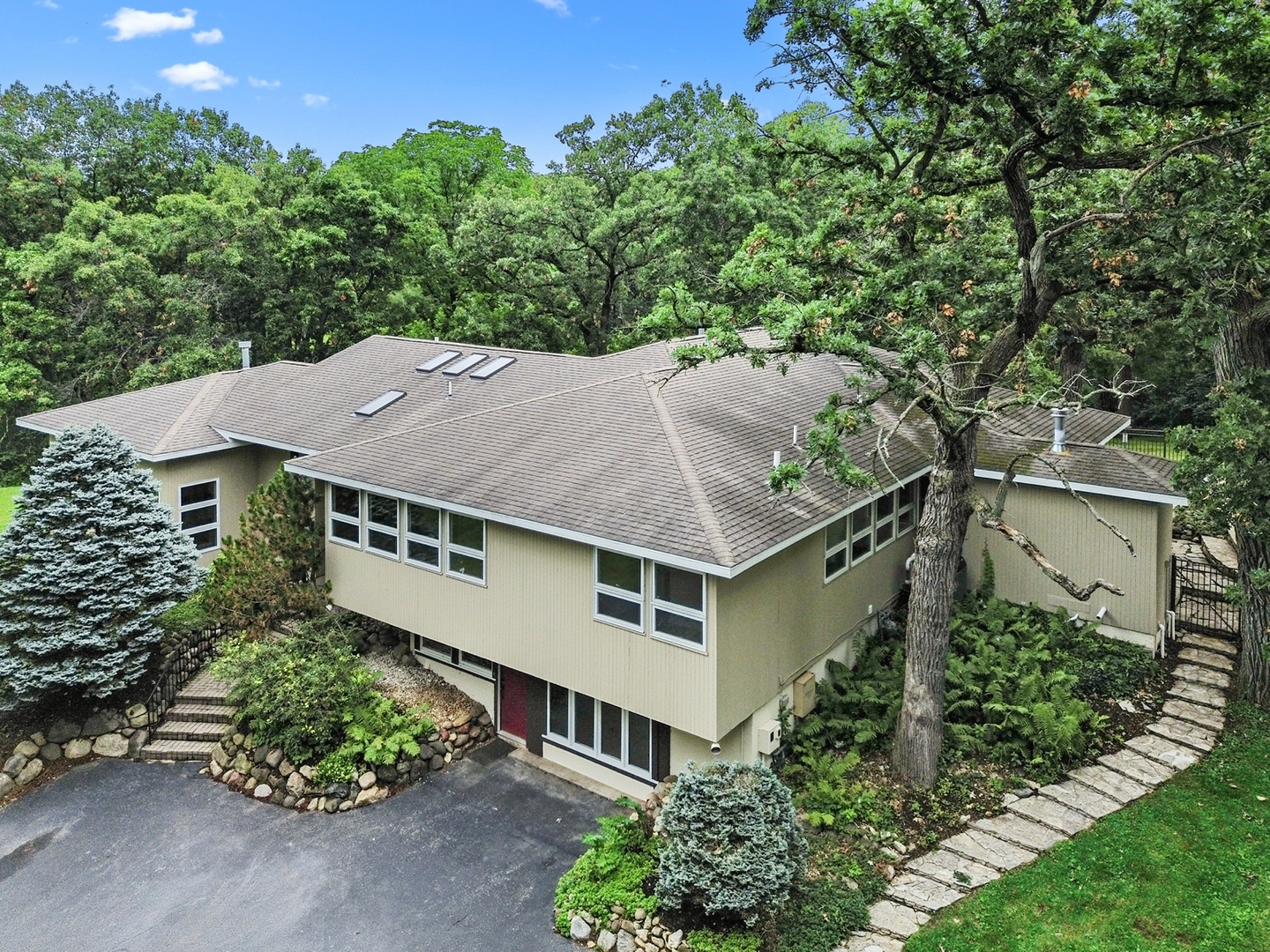 904 North Valley Hill Road Bull Valley, IL 60098 - Photo 1 of 33 an aerial view of a house with a yard and potted plants