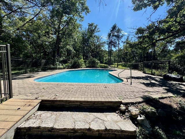 904 North Valley Hill Road Bull Valley, IL 60098 - Photo 2 of 33 a view of a swimming pool with a yard