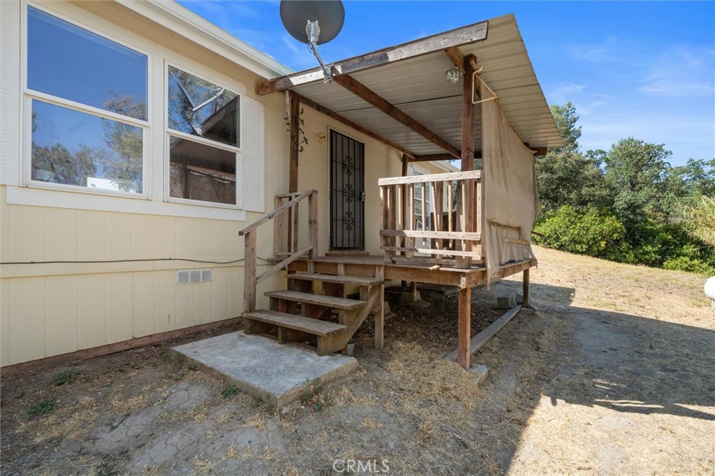 16080 Oakridge Road Corning, CA 96021 - Photo 2 of 39 a view of a patio with a table and chairs