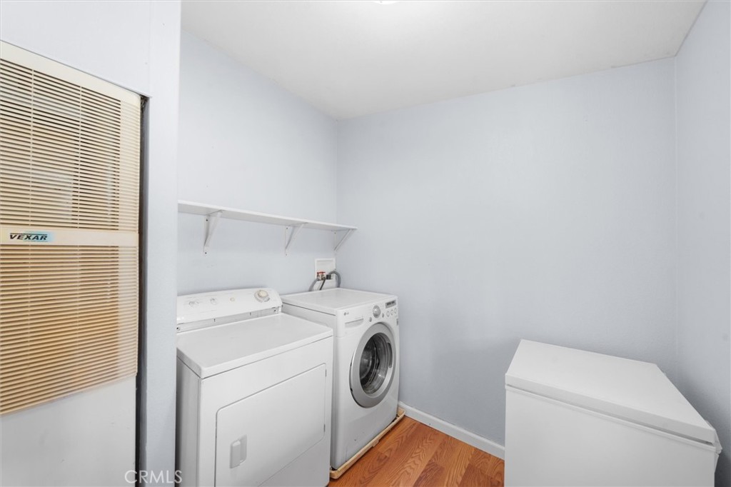 16080 Oakridge Road Corning, CA 96021 - Photo 22 of 39 a utility room with dryer and washer