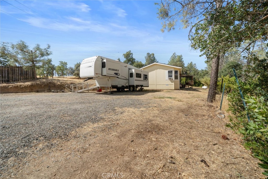 16080 Oakridge Road Corning, CA 96021 - Photo 23 of 39 a front view of a house with a yard