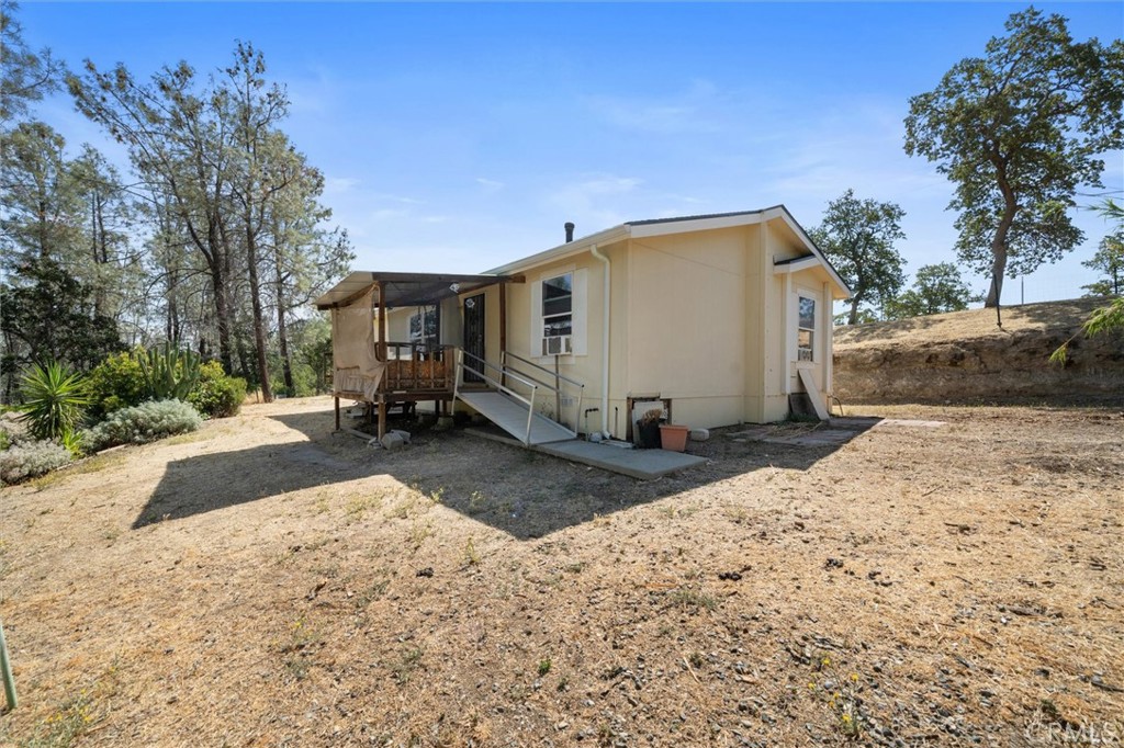 16080 Oakridge Road Corning, CA 96021 - Photo 25 of 39 a view of a house with a snow in the yard