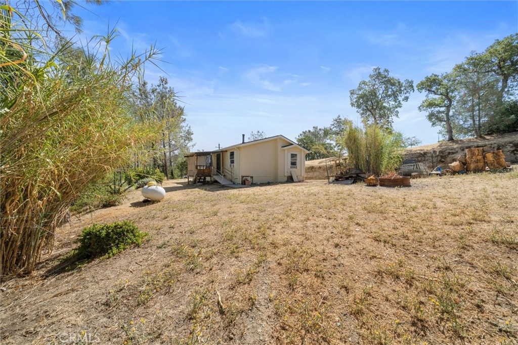 16080 Oakridge Road Corning, CA 96021 - Photo 26 of 39 a view of yard covered with snow in front of house