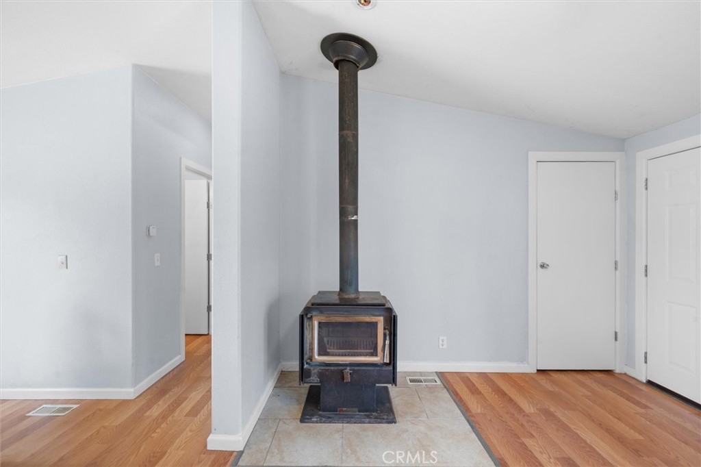 16080 Oakridge Road Corning, CA 96021 - Photo 6 of 39 a view of a livingroom with a table and a chair
