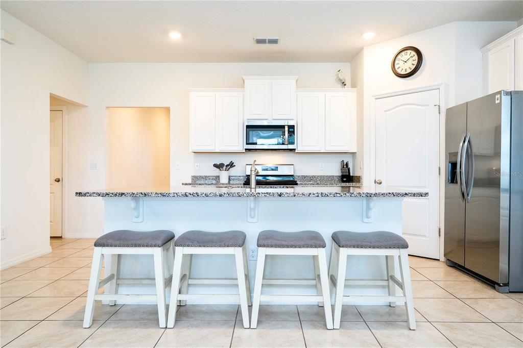 7560 Oakmoss Loop Davenport, FL 33837 - Photo 4 of 57