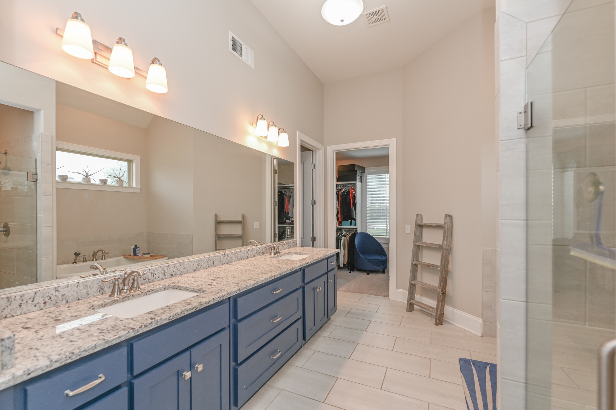 1431 Center Point Road Hendersonville, TN 37075 - Photo 11 of 20 a spacious bathroom with a granite countertop sink mirror and shower