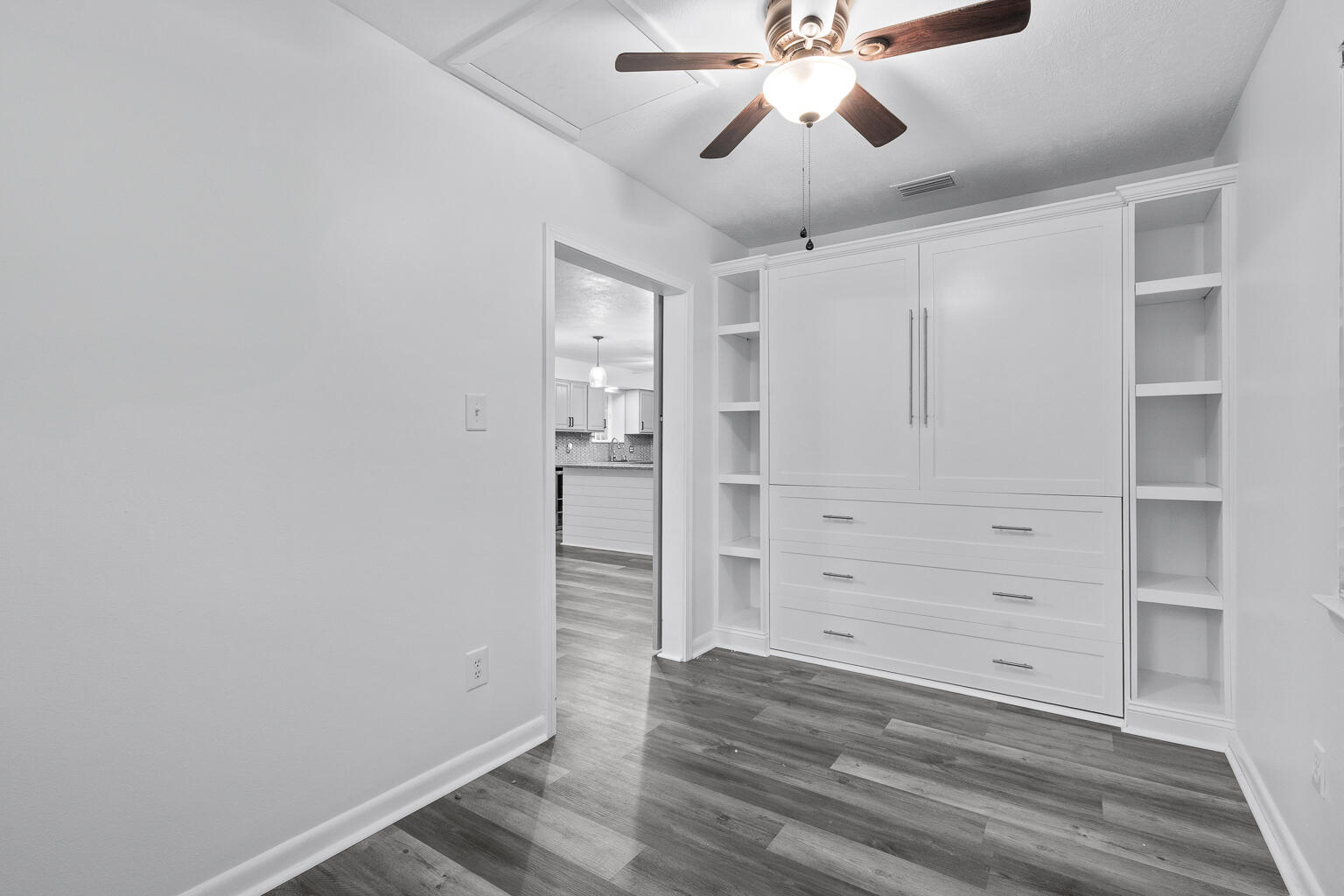 3961 Painter Branch Road Crestview, FL 32539 - Photo 18 of 49 wooden floor in an empty room