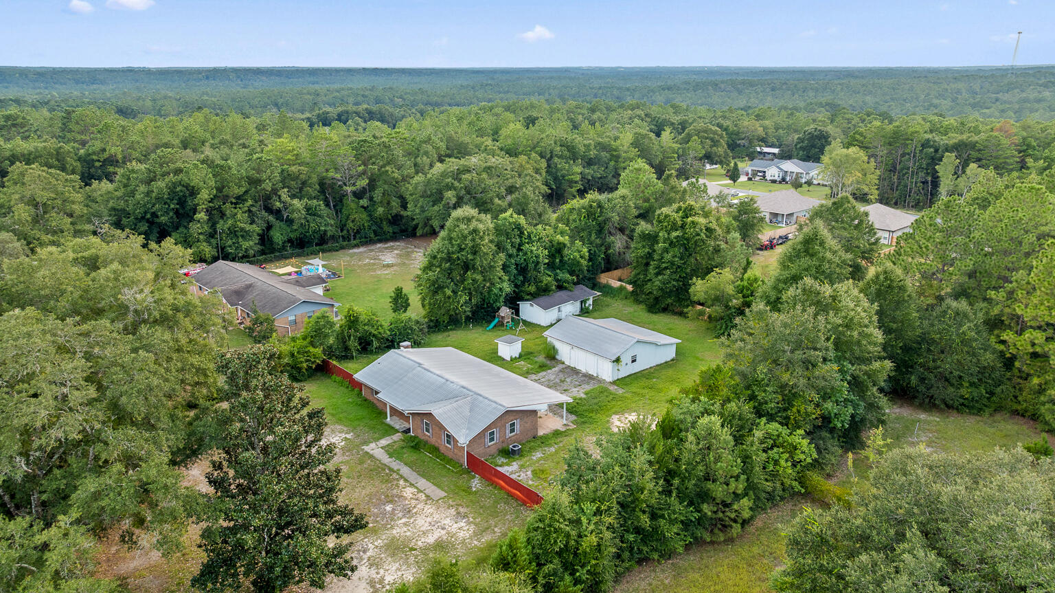 3961 Painter Branch Road Crestview, FL 32539 - Photo 2 of 49 an aerial view of residential house with outdoor space