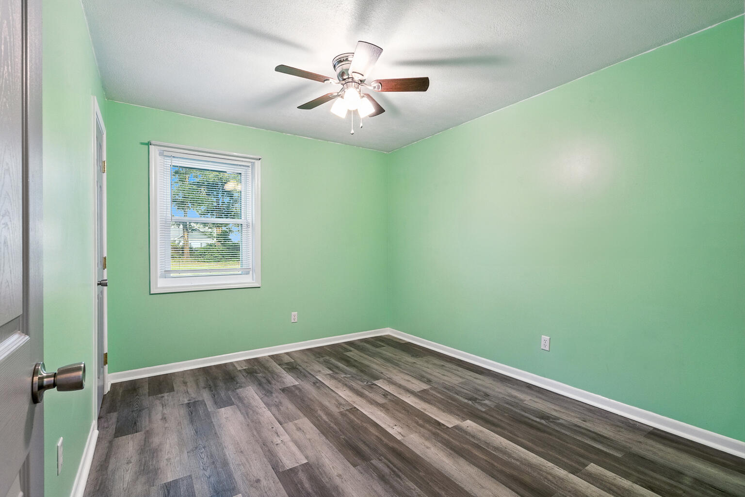 3961 Painter Branch Road Crestview, FL 32539 - Photo 21 of 49 a view of room with window and ceiling fan
