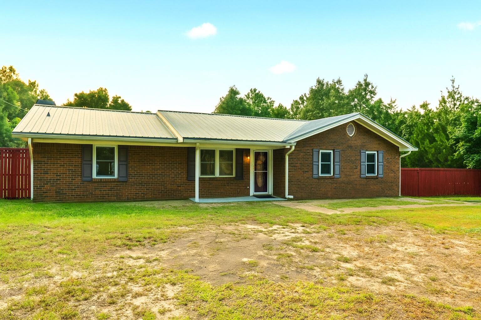 3961 Painter Branch Road Crestview, FL 32539 - Photo 32 of 49 a front view of a house with a yard