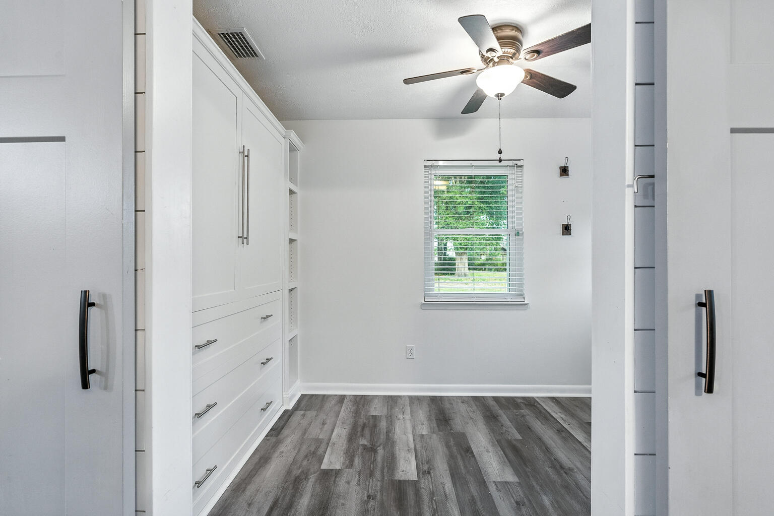 3961 Painter Branch Road Crestview, FL 32539 - Photo 43 of 49 a view of an empty room with a window