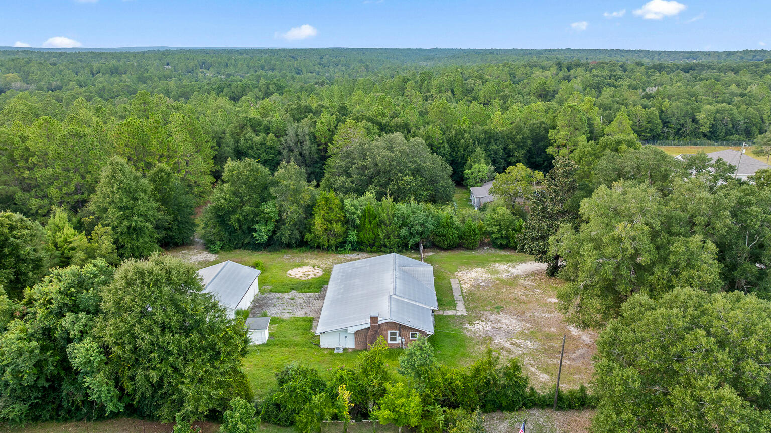 3961 Painter Branch Road Crestview, FL 32539 - Photo 44 of 49 a view of a garden with plants