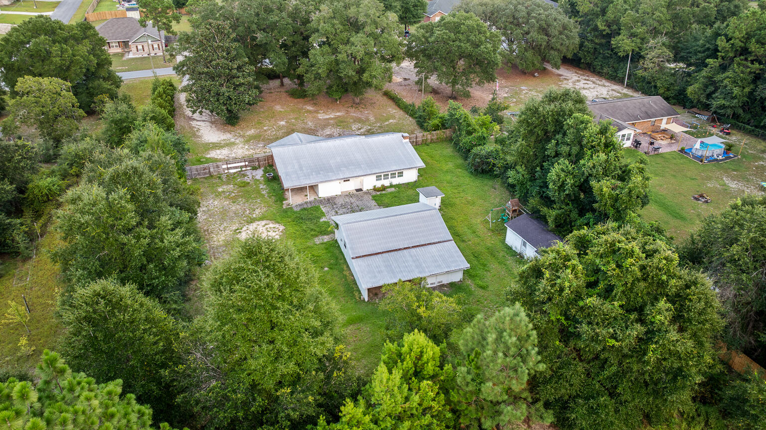 3961 Painter Branch Road Crestview, FL 32539 - Photo 46 of 49 an aerial view of a house with a yard