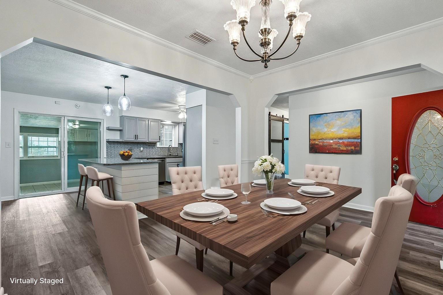3961 Painter Branch Road Crestview, FL 32539 - Photo 5 of 49 a open dining room with furniture a kitchen view and wooden floor