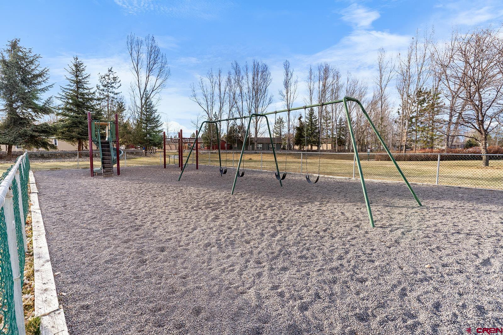 901 6530 Road, Unit 1414 Montrose, CO 81401 - Photo 6 of 16 a view of park with swings