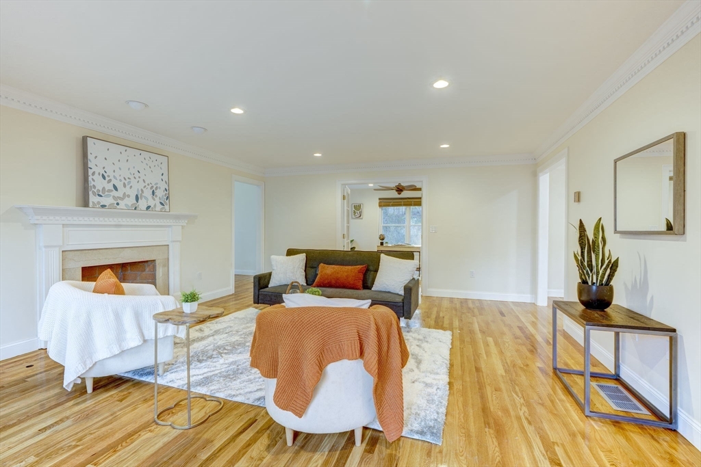 17 Bridle Path Walpole, MA 02081 - Photo 5 of 38 a living room with furniture and a lamp