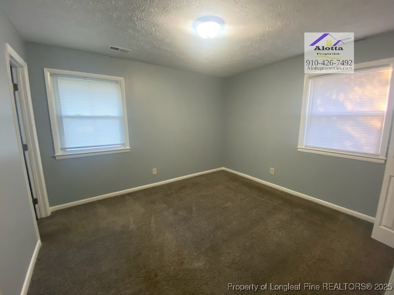 6527 Tareyton Road Fayetteville, NC 28314 - Photo 10 of 11 an empty room with a window