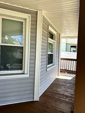 a view of a balcony with a door