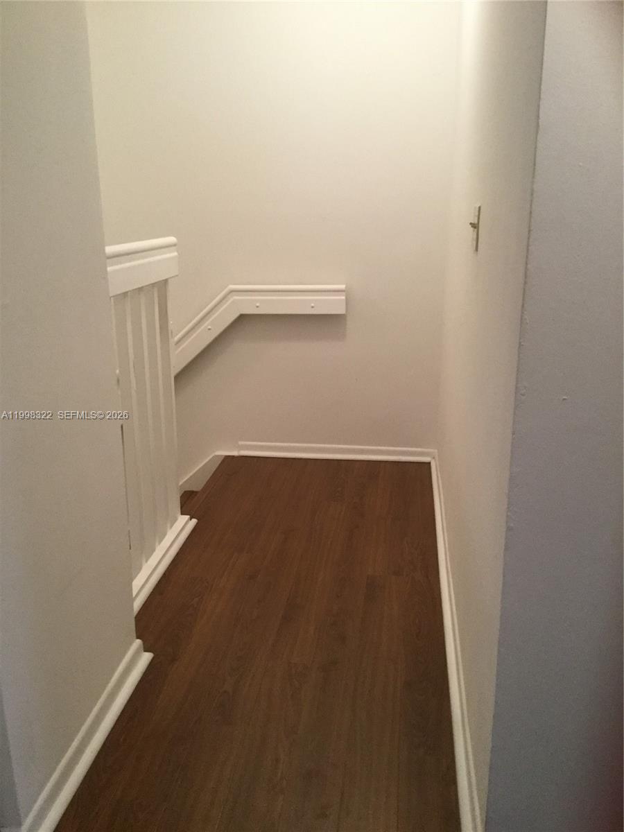 15241 Southwest 80th Street, Unit 307 Miami, FL 33193 - Photo 12 of 13 a view of small space with racks on the wall