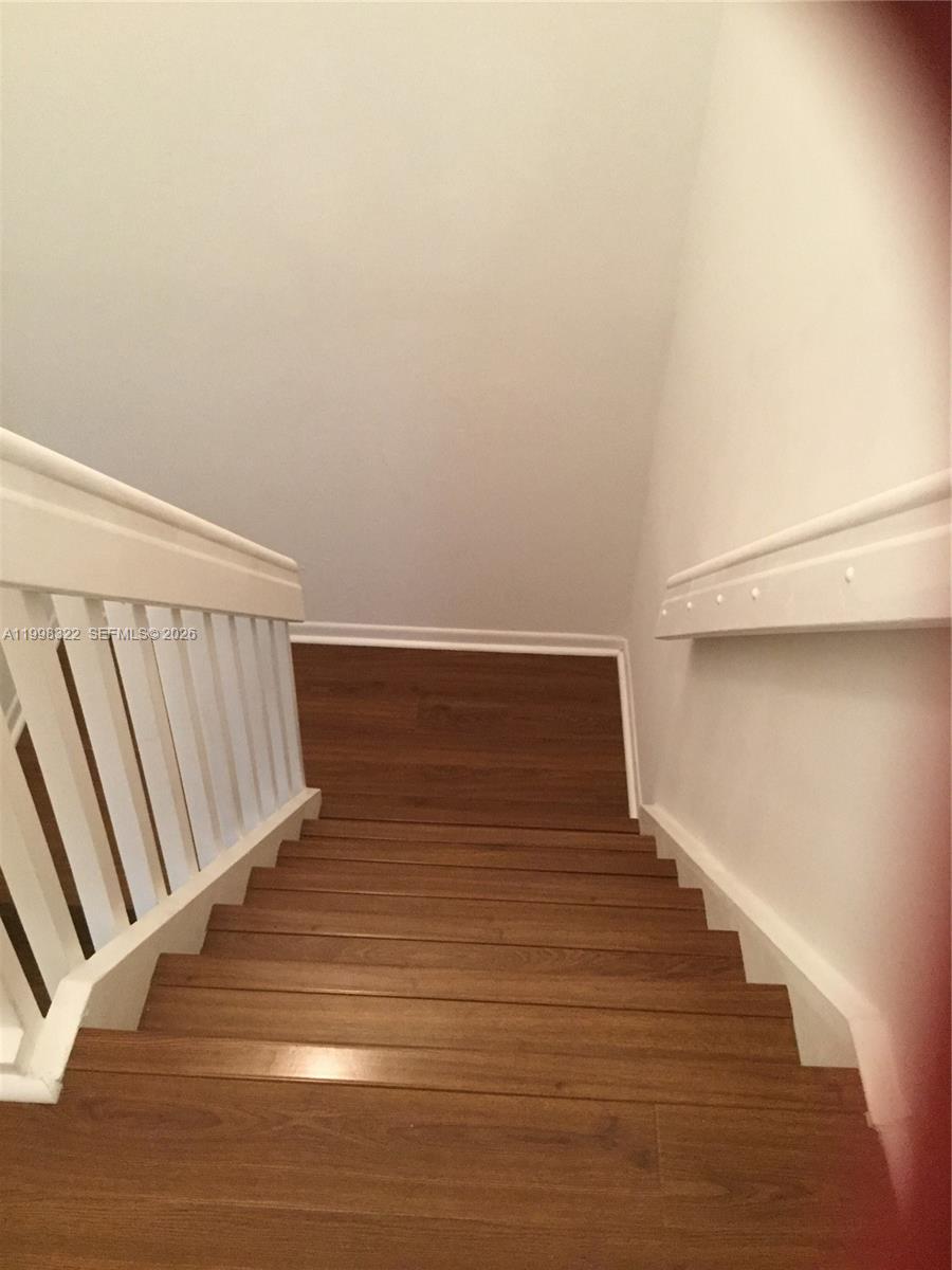 15241 Southwest 80th Street, Unit 307 Miami, FL 33193 - Photo 13 of 13 a view of entryway with wooden floor