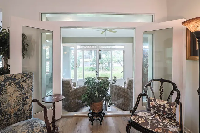 a view of a dining room with furniture window and wooden floor