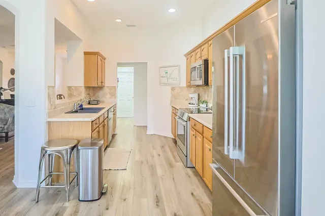 a bathroom with a bathtub and a sink