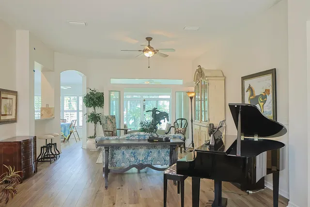 a view of a dining room with furniture window and wooden floor