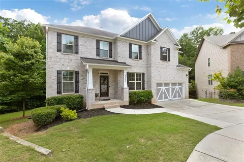 a house view with a garden space