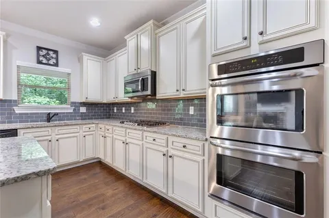 a view of a two chairs in the deck