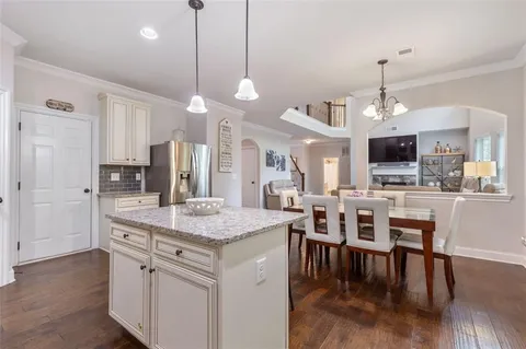 a spacious bedroom with a bed and window